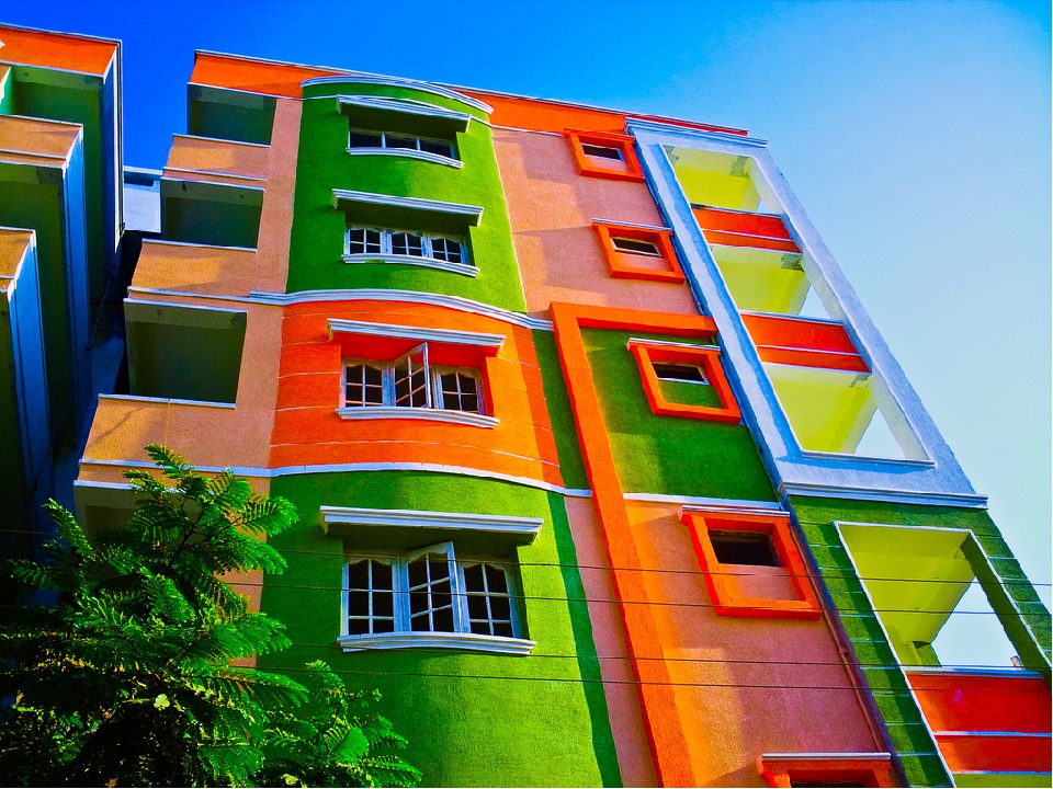 Фотография дома окрашенного фасадной краской